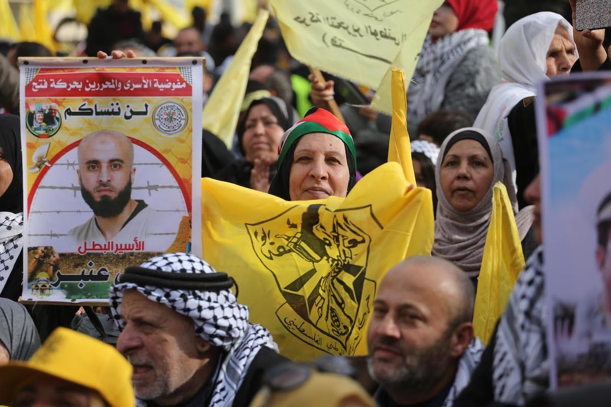 Palestinos se reúnem para apoiar o movimento palestino Fatah na cidade de Gaza, Gaza em 1 de janeiro de 2020 [Mohammed Asad/Monitor do Oriente Médio]
