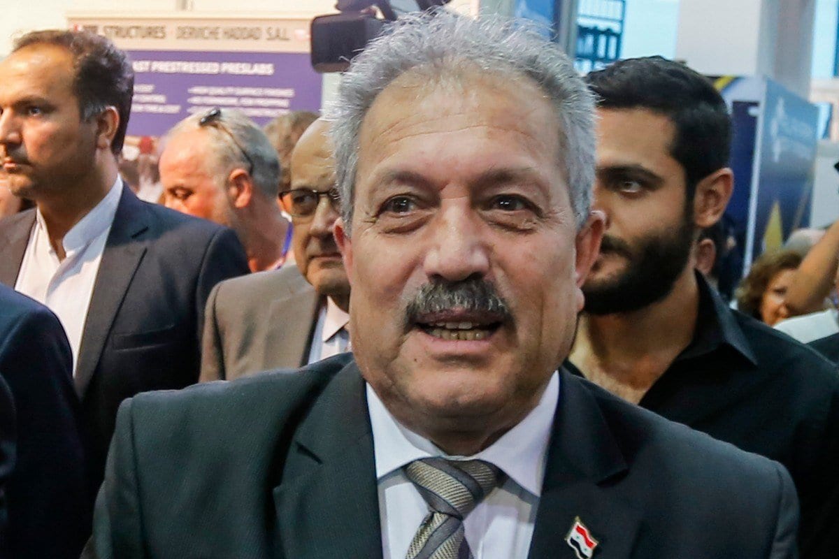Primeiro-ministro sírio Hussein Arnous em Damasco, Síria em 2 de outubro de 2018 [Louai Beshara/ AFP/ Getty Images]