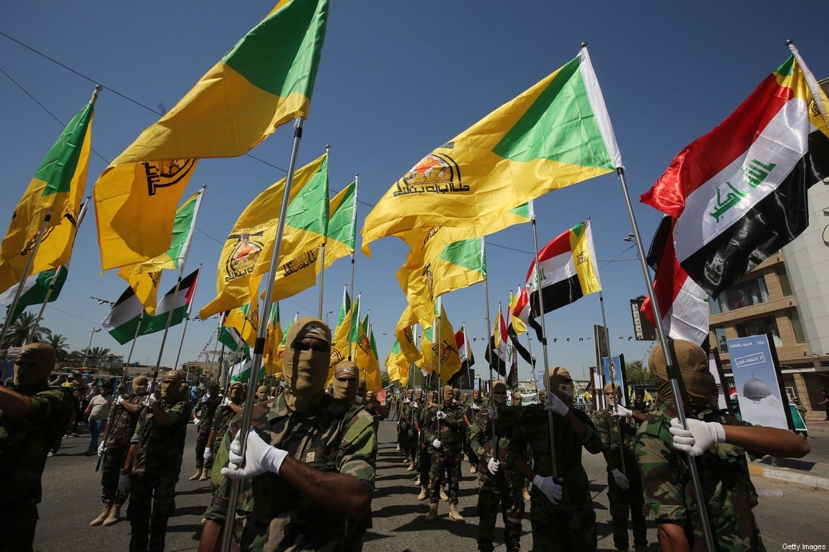 Brigadas do Hezbollah marcham em Bagdá, Iraque, 31 de maio de 2019 [Ahmad al-Rubaye/AFP/Getty Images]