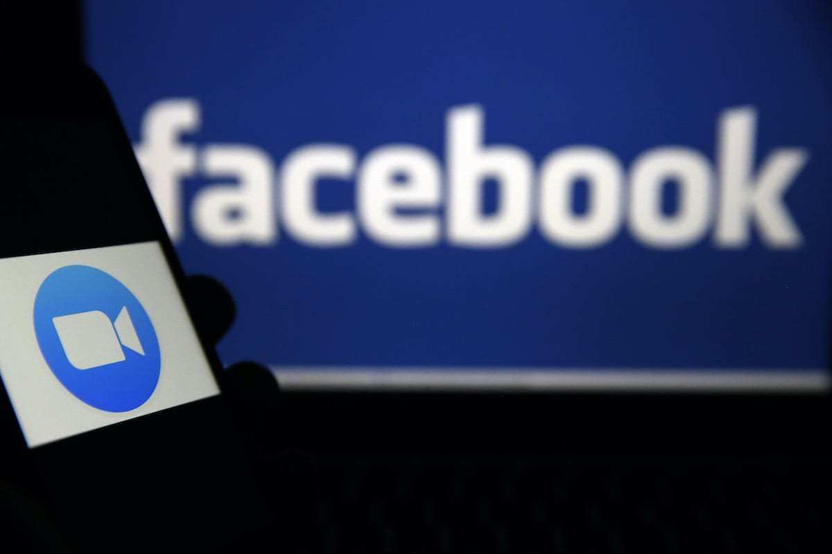 Nesta foto, a ilustração mostra logotipos de aplicativos de mídia social Facebook e Zoom, em 2 de abril de 2020. [Mehmet Ali Özcan/Agência Anadolu]