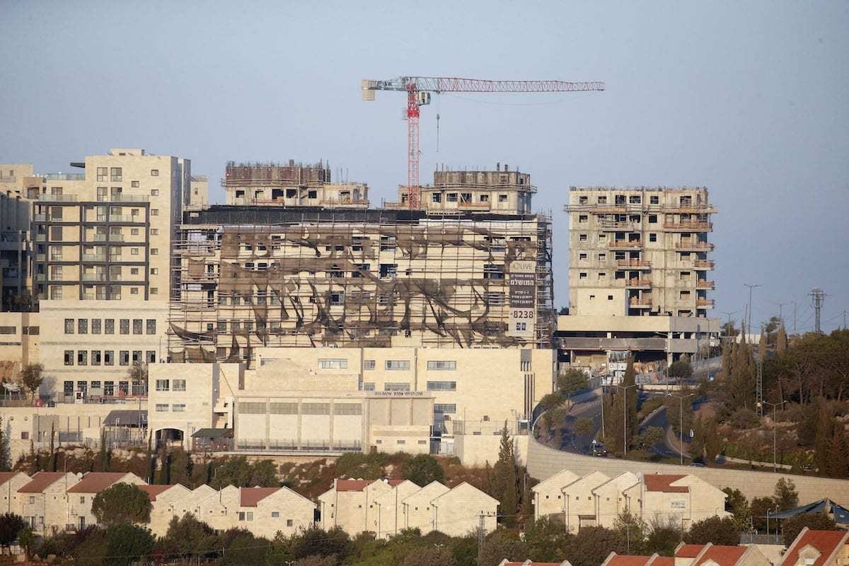 Novos edifícios em assentamento ilegal israelense na cidade de Belém, Cisjordânia ocupada, 14 de outubro de 2020 [Hazem Bader/AFP via Getty Images]