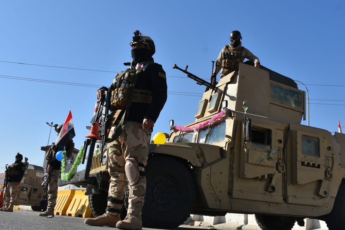 Soldados iraquianos em Kirkuk, Iraque, 3 de janeiro de 2021 [Ali Makram Ghareeb/Agência Anadolu]