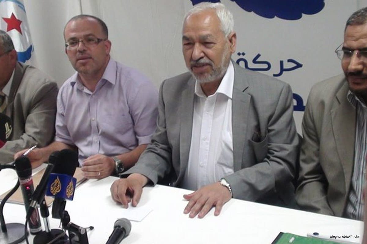 Rached Ghannouchi (centro) durante conferência do partido Ennahda [Magharebia/Flickr]