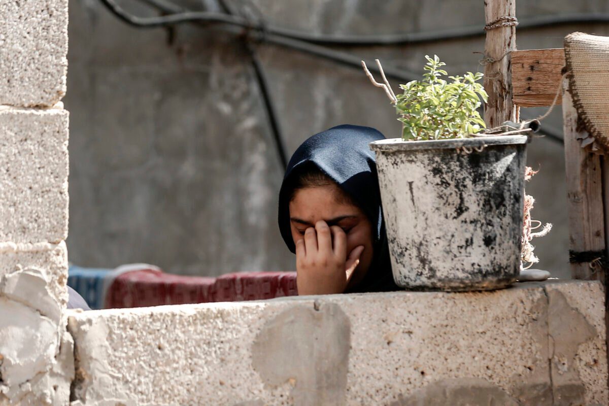 Mulher enlutada em 27 de setembro de 2020 [MAHMUD HAMS/AFP via Getty Images]
