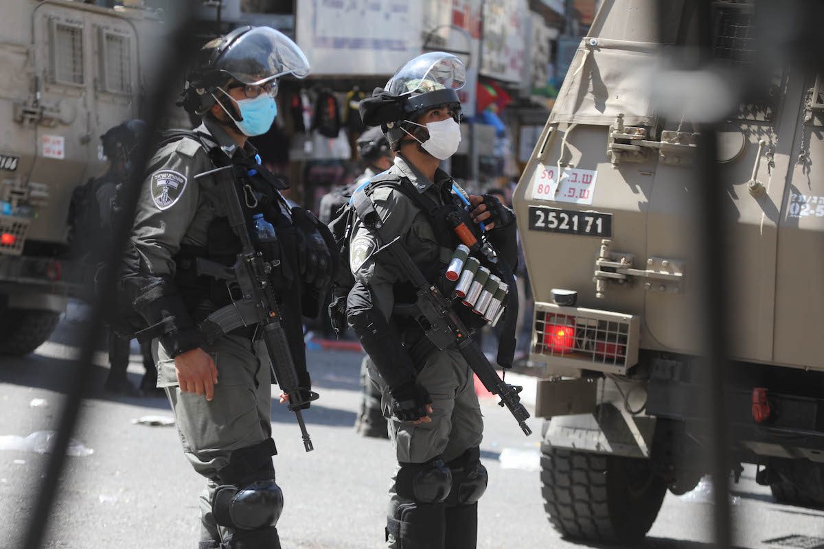 Forças israelenses em Hebron (Al-Khalil), Cisjordânia ocupada, 22 de setembro de 2021 [Mamoun Wazwaz/Agência Anadolu]
