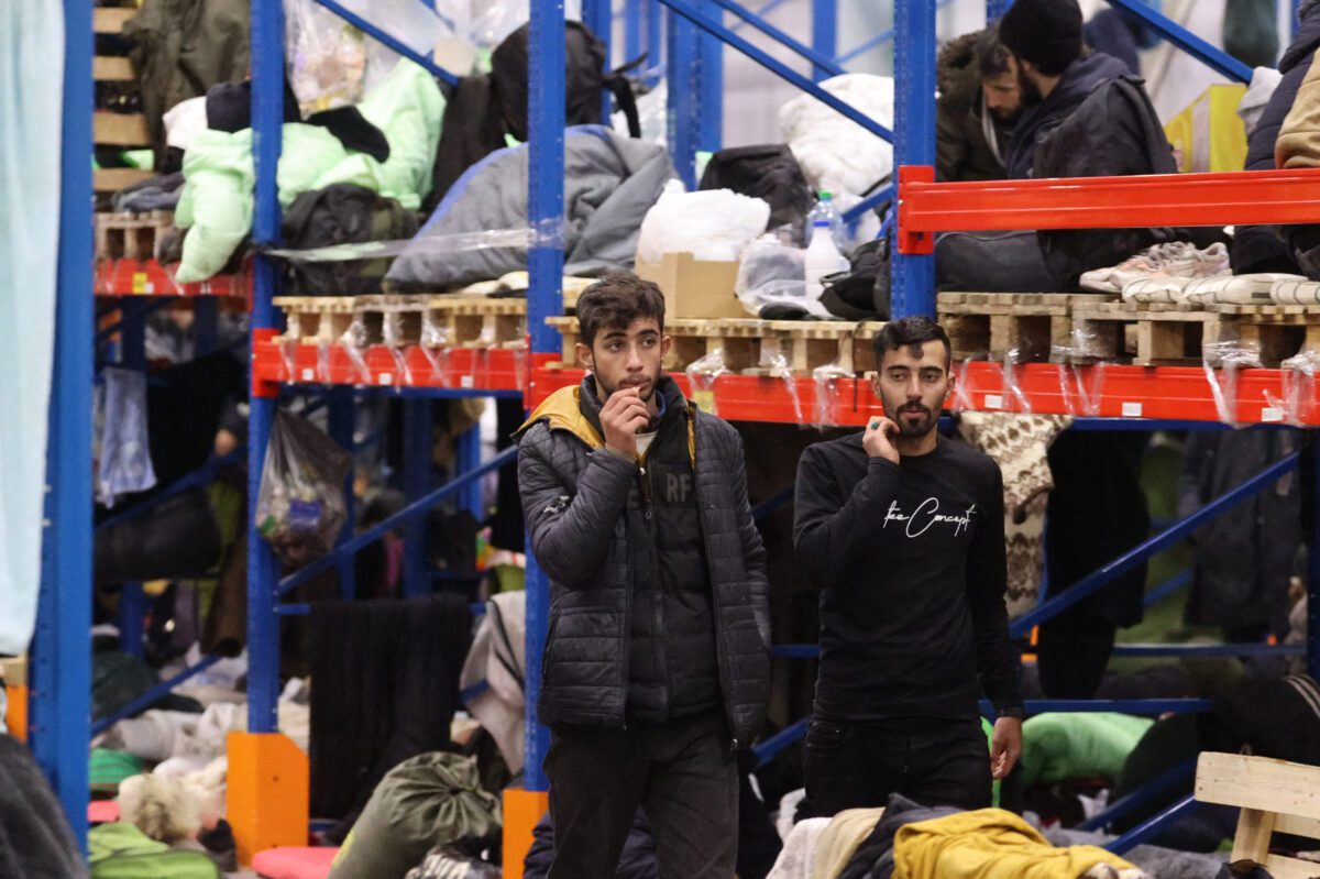 Refugiados sírios em 19 de novembro de 2021 [MAXIM GUCHEK/BELTA/AFP via Getty Images]