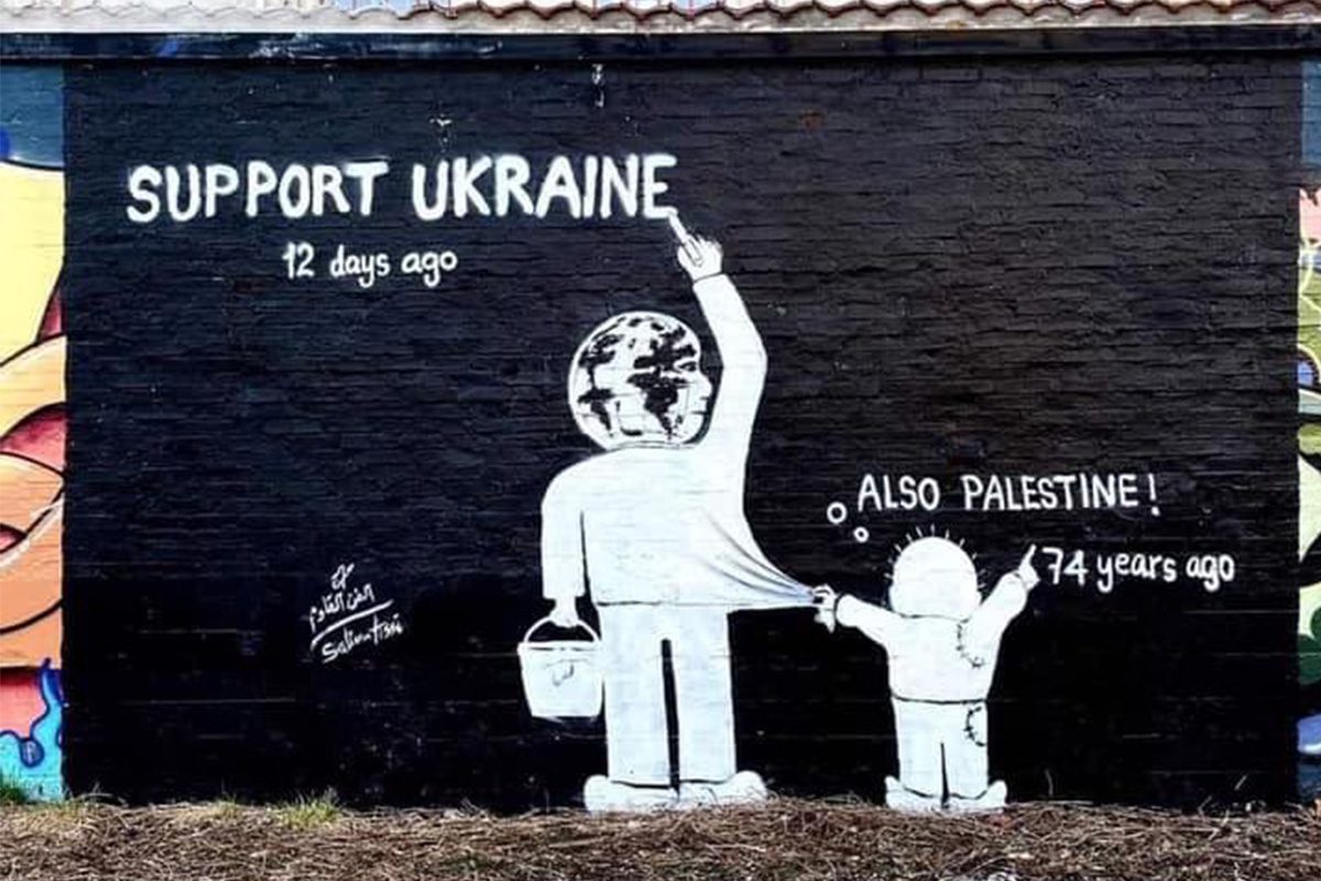 Um mural em apoio à Ucrânia e à Palestina