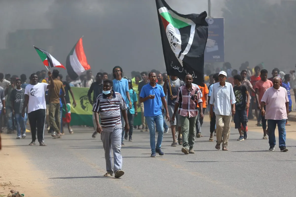 Protesto reivindica governo civil em Cartum, capital do Sudão, 18 de agosto de 2022 [Mahmoud Hjaj/Agência Anadolu]

