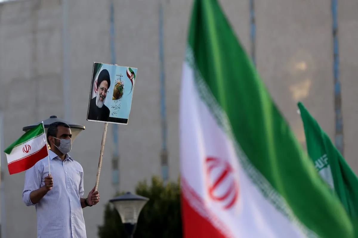 Comício do então chefe do judiciário iraniano Ebrahim Raisi, durante a campanha presidencial iraniana, na praça Hafte Tir, em Teerã, 14 de junho de 2021 [Fatemeh Bahrami/Agência Anadolu]
