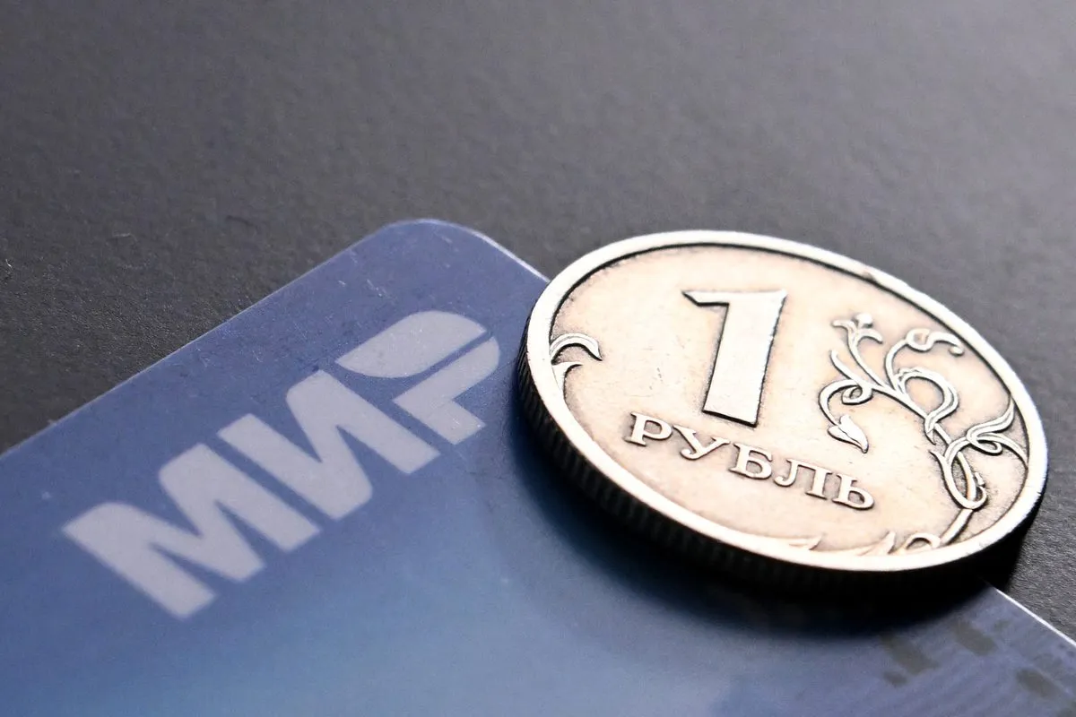 Logotipo do sistema de pagamentos MIR, desenvolvido na Rússia, em 14 de março de 2022 [AFP/Getty Images]
