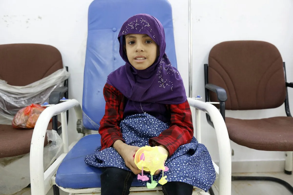 Crianças recebem tratamento médico [Mohammed Hamoud/Agência Anadolu]