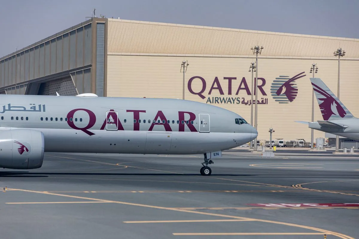 Aeronave da Qatar Airways no aeroporto internacional de Doha [Christopher Pike/Bloomberg/Getty Images]
