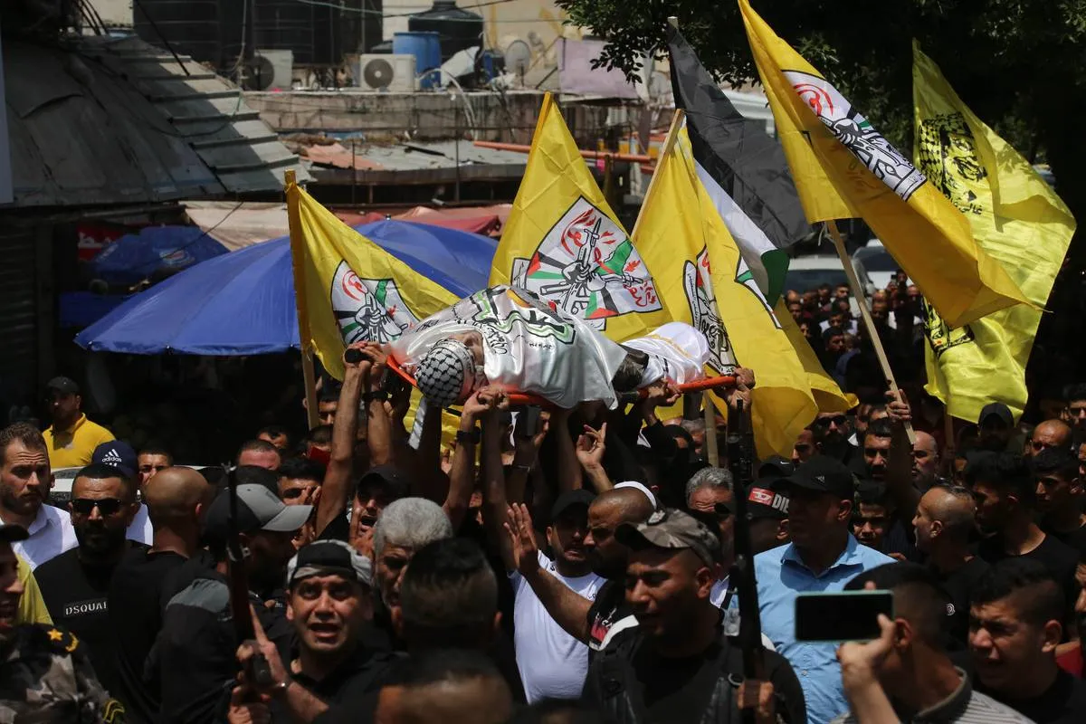 Funeral de Ashraf Muhammad Amin Ibrahim (37), morto durante um ataque israelense a Jenin, na Cisjordânia ocupada, em 29 de maio de 2023 [Nedal Eshtayah/Agência Anadolu]
