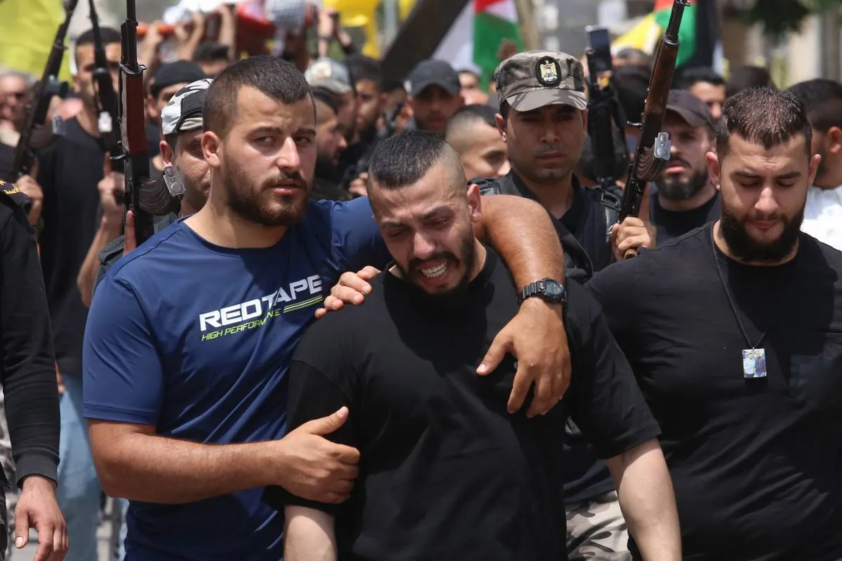 Funeral de Ashraf Muhammad Amin Ibrahim (37), morto por Israel em Jenin, na Cisjordânia ocupada, em 29 de maio de 2023 [Nedal Eshtayah/Agência Anadolu]
