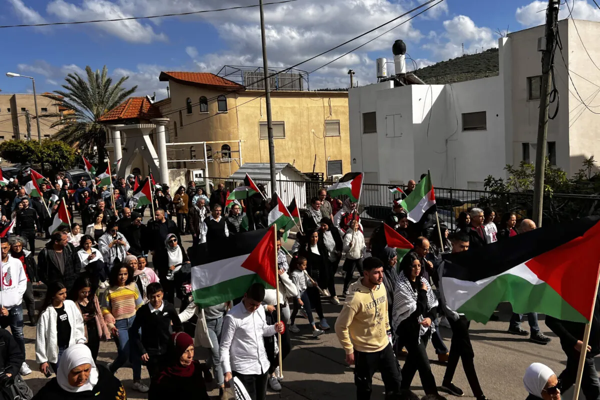 Cidadãos árabes do Estado de Israel celebram o 47° Dia da Terra em Sakhnin, em 30 de março de 2023 [Samir Abdalhade/Agência Anadolu via Getty Images]
