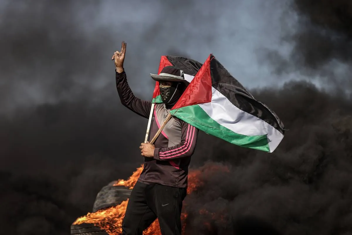 Protesto palestino contra a violência isrelense em Jenin, na Cidade de Gaza, em 3 de julho de 2023 [Ali Jadallah/Agência Anadolu]
