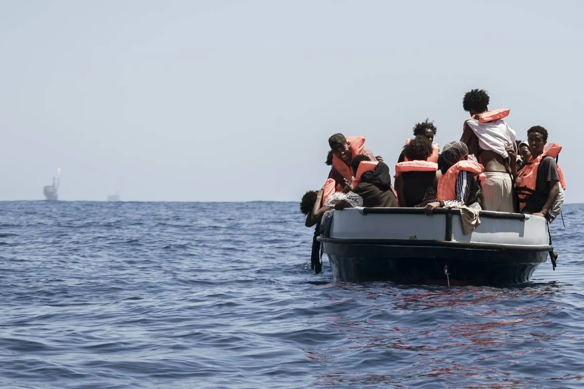 Refugiados são resgatados pela ong espanhola Open Arms, no litoral da Líbia, em 2 de agosto de 2023 [Valeria Ferraro/Agência Anadolu]
