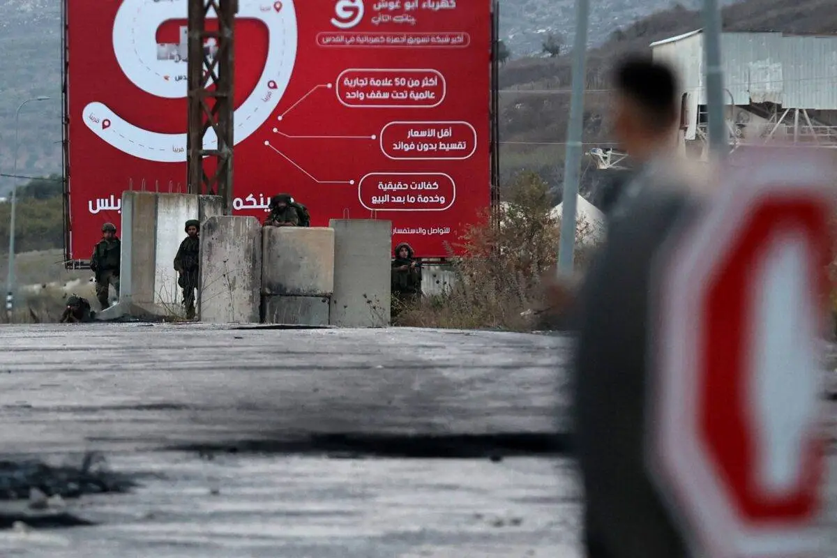 Forças de ocupação israelenses no checkpoint de Huwara, na Cisjordânia, Palestina ocupada, em 8 de outubro último [Zain Jaafar/AFP via Getty Images]
