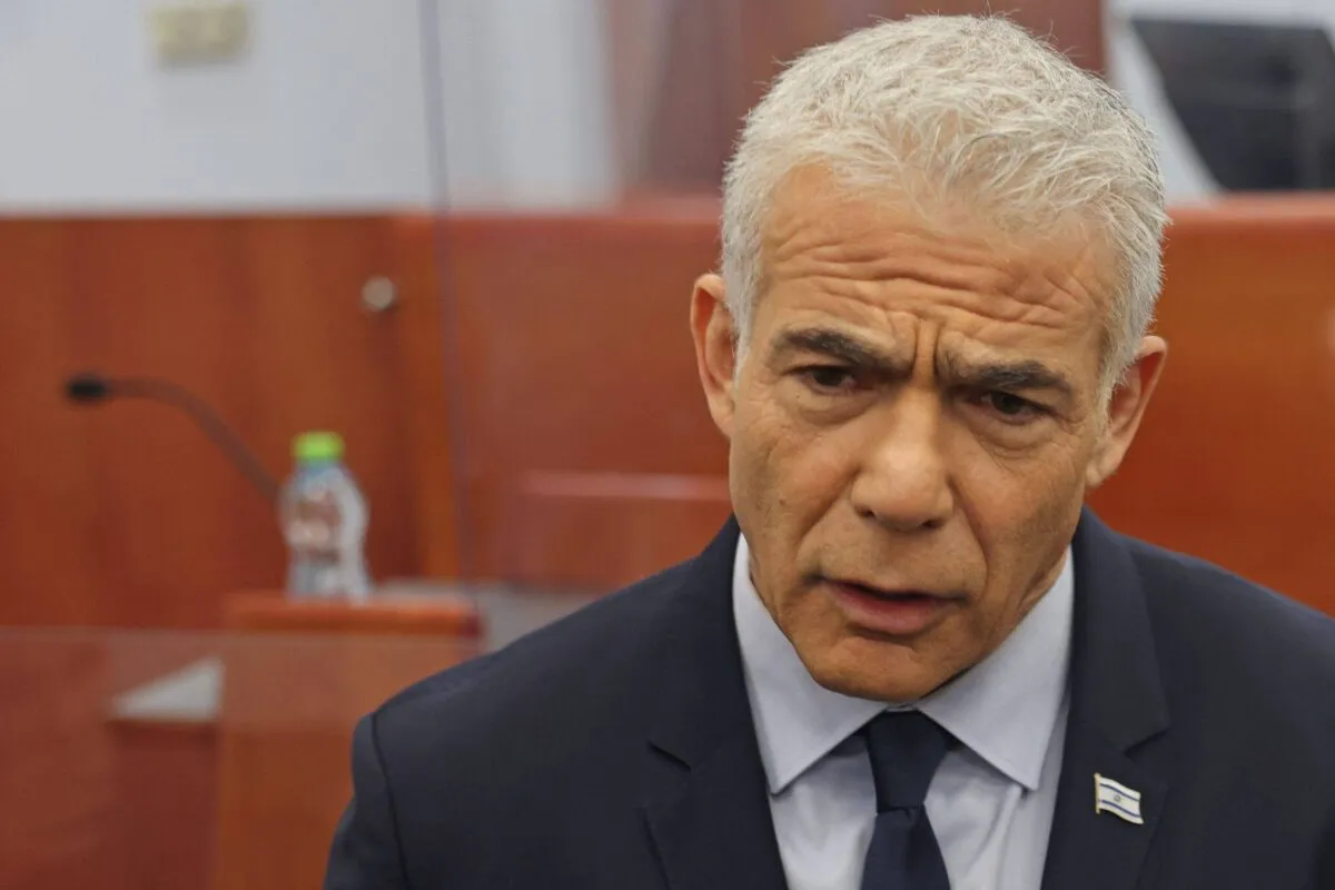 O ex-primeiro-ministro israelense e líder da oposição Yair Lapid em 12 de junho de 2023 [Menahem Kahana/AFP via Getty Images]
