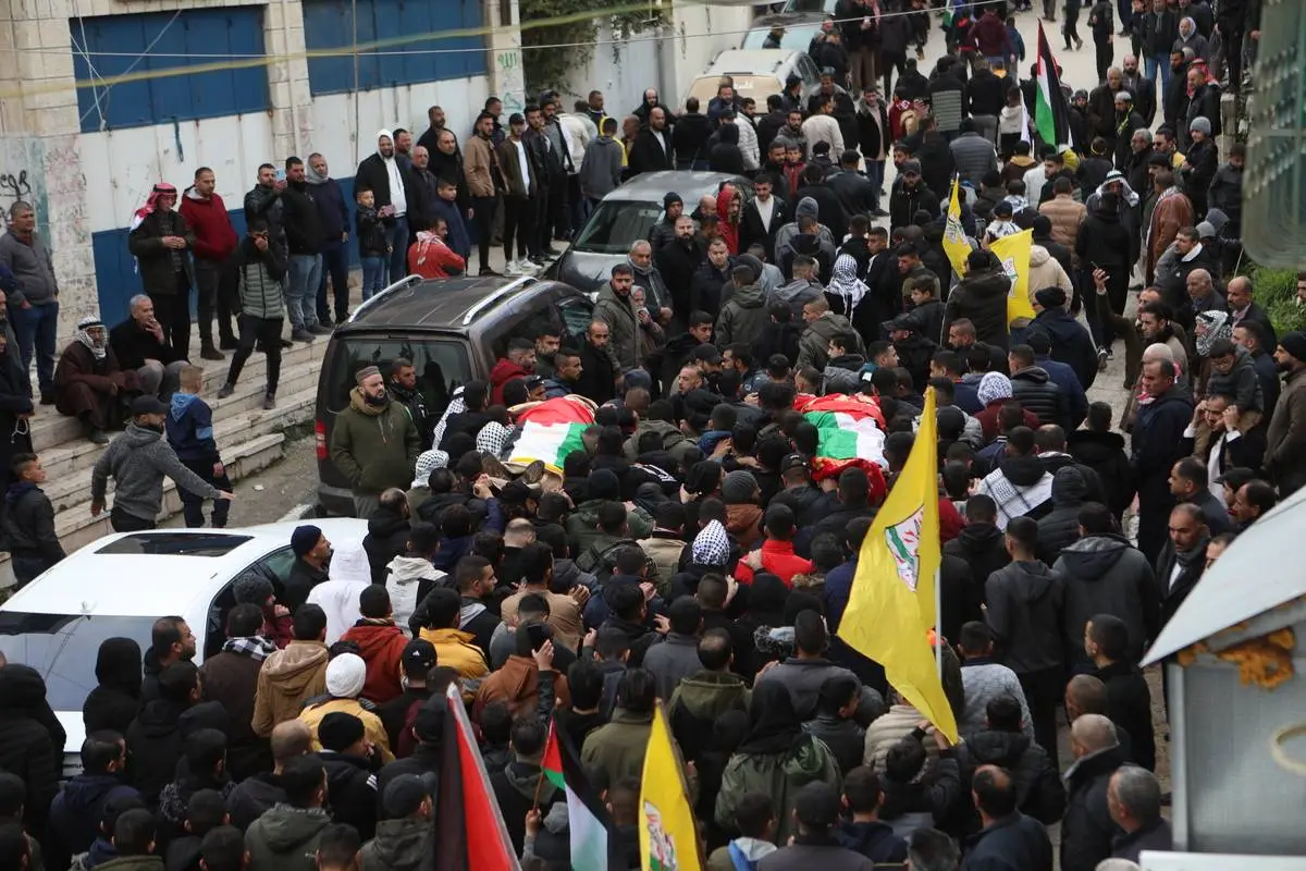 Funeral de Ahmad Mousa Mohamed Jabbarin e Jalal Isa Mohamed Jabbarin, mortos por tropas israelenses em Hebron (Al-Khalil), na Cisjordânia ocupada, em 15 de janeiro de 2024 [Mamoun Wazwaz/Agência Anadolu]

