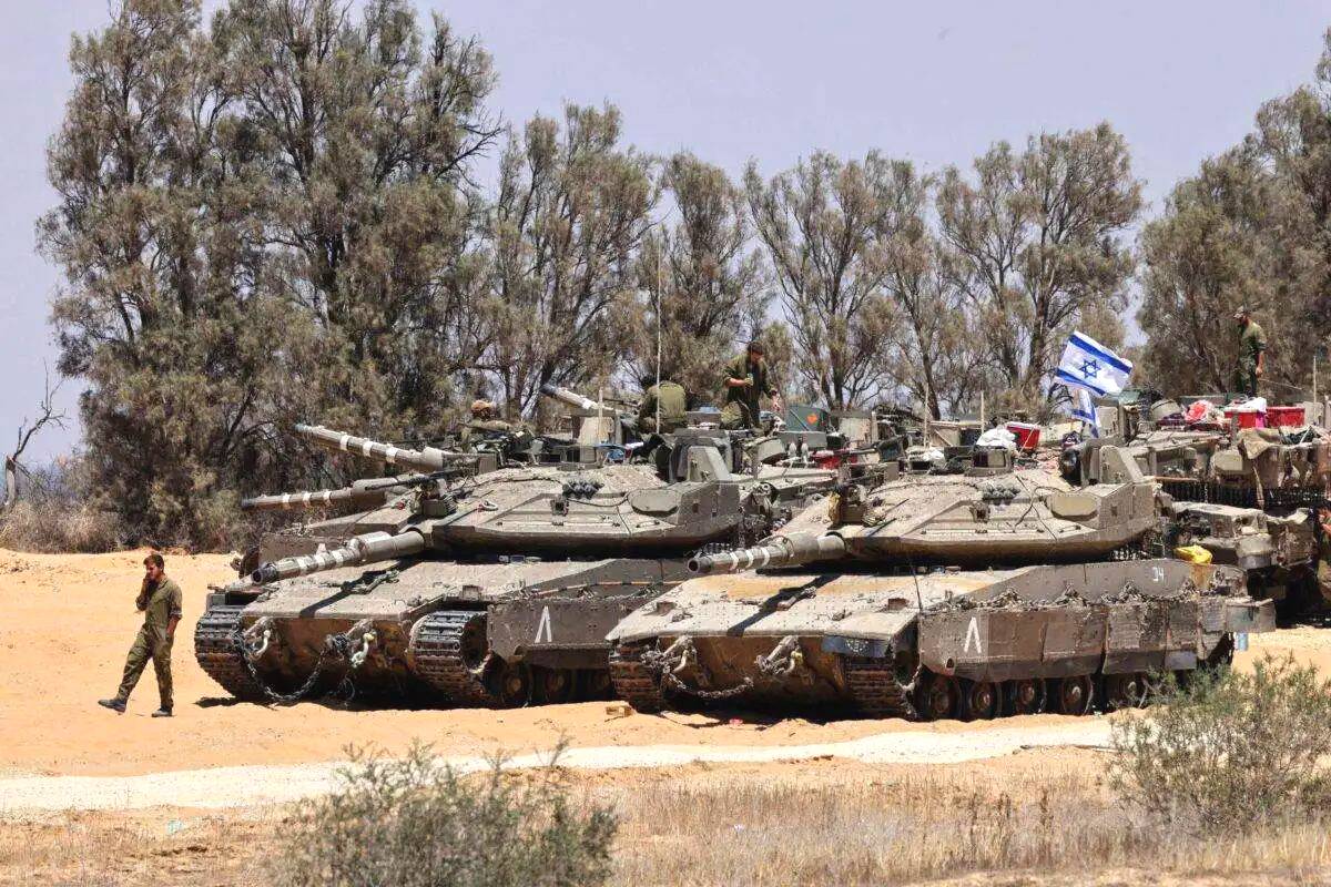 Tanques israelenses na zona de fronteira com Gaza, em 29 de maio de 2024 [Jack Guez/AFP via Getty Images]

