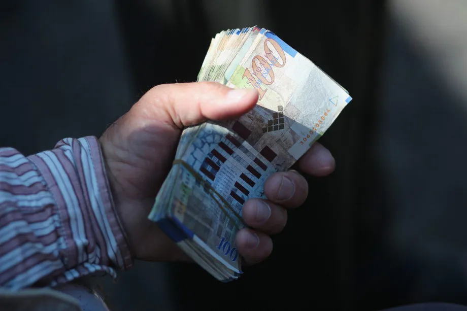 Shekels israelenses. [Christopher Furlong/Getty Images]